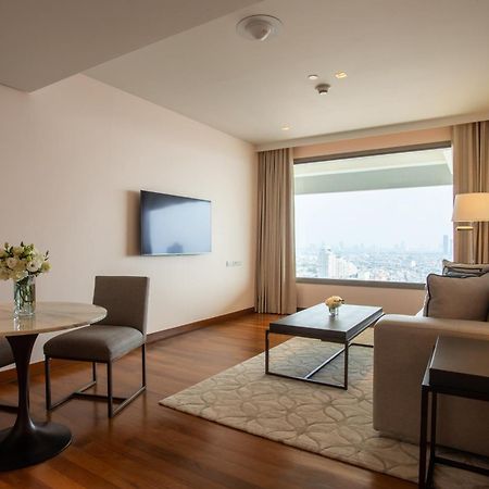 فندق أفاني+ ريفر سايد بانكوك المظهر الخارجي الصورة Living room of a suite