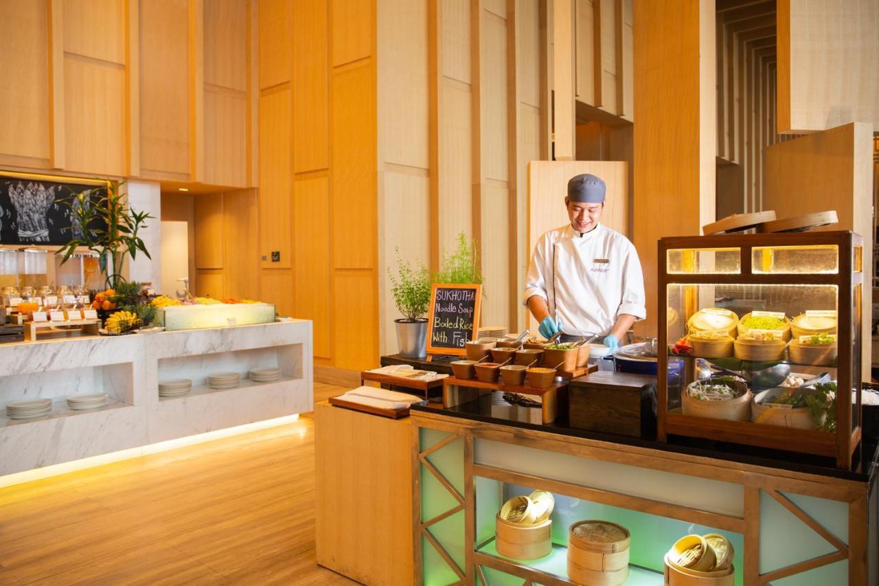 فندق أفاني+ ريفر سايد بانكوك المظهر الخارجي الصورة A live kitchen at a hotel